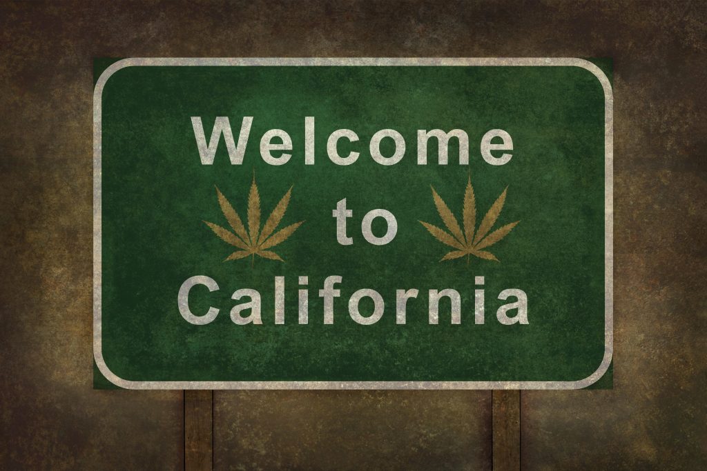 Welcome to California state sign with marijuana leaves on it 