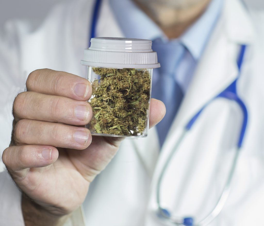 marijuana doctor holding prescription